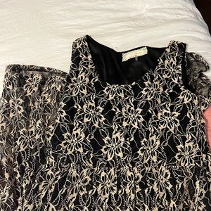 Floor length, sleeveless dress from Altar’d State. Black & cream, size Large